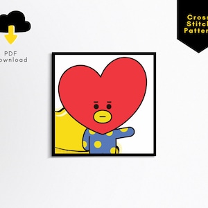 May include: Cross stitch pattern featuring a red heart-shaped character with a blue and yellow polka dot shirt. The character has a surprised expression with closed eyes and a small mouth.