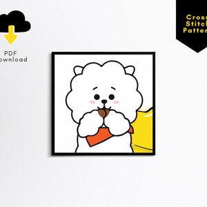 Puede incluir: Un personaje blanco y esponjoso con ojos marrones y una bufanda roja está sosteniendo una galleta marrón. El personaje está en un marco negro con un fondo amarillo.