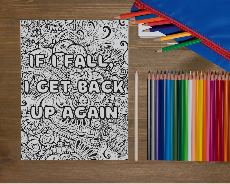 May include: A black and white coloring page with a motivational quote: "If I fall, I get back up again." The quote is surrounded by intricate floral designs.
