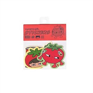 May include: A pack of Tomato Girl stickers in a red and white cardboard header with the text TOMATO GIRL STICKERS. The package contains die-cut stickers featuring a cartoon tomato character with arms and legs, and a person wearing a tomato costume.