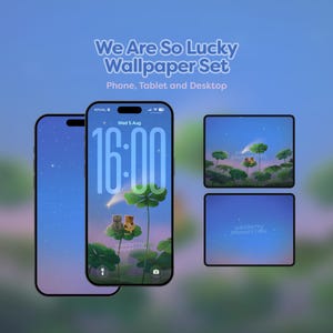 May include: A digital wallpaper set titled We Are So Lucky Wallpaper Set for phone, tablet, and desktop. The display shows a blue night sky with stars, a shooting star, and two small cats sitting on a large green clover leaf illustration.
