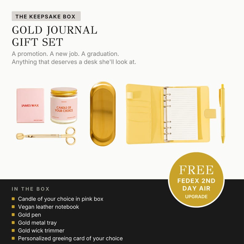 The image is an advertisement for a gift set called "The Keepsake Box" that includes a gold journal, a gold pen, a gold metal tray, a gold wick trimmer, and a personalized greeting card. The set is presented in a pink box, and there is a free upgrade offer for the contents of the box.