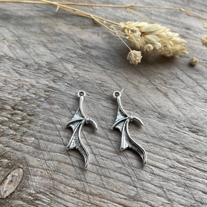Demon wing charm connectors