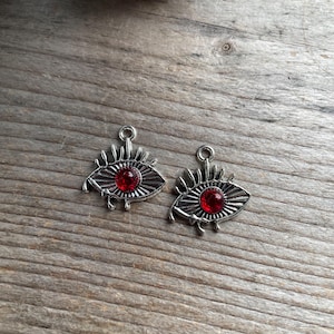 Red and silver eye charms  21 x 22mm