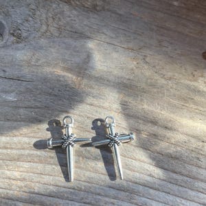 Nail cross charms
