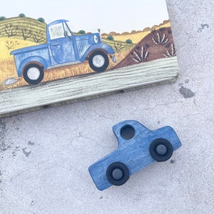 The LITTLE BLUE TRUCK maple wood nontoxic ecofriendly stained rolling mini truck wooden toy