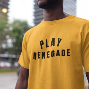 May include: A yellow t-shirt with the text "PLAY RENEGADE" printed in black.