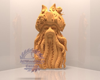 May include: A detailed wooden carving of a pirate with an octopus beard and a hat adorned with seashells and other nautical elements. The carving is painted in a light brown colour.