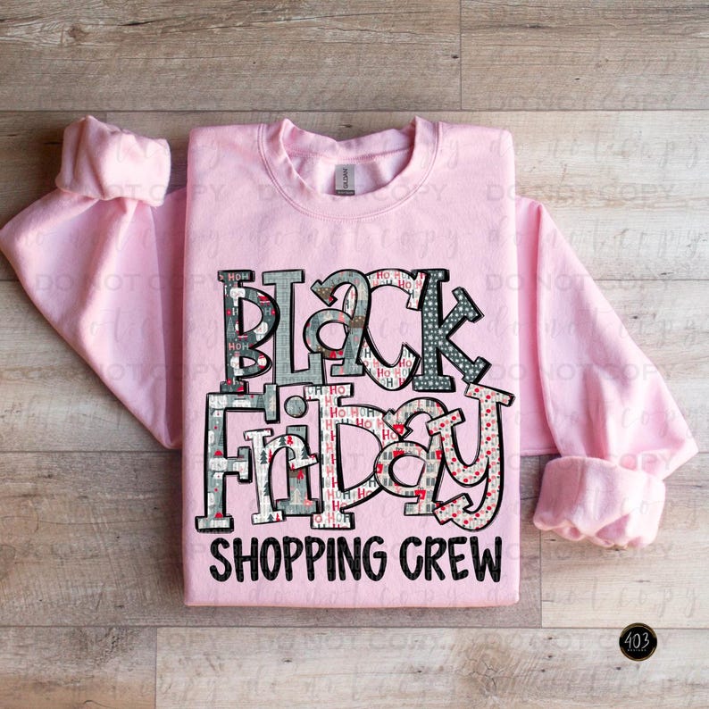 May include: Pink crew neck sweatshirt with a black and white graphic print that says "Black Friday Shopping Crew".