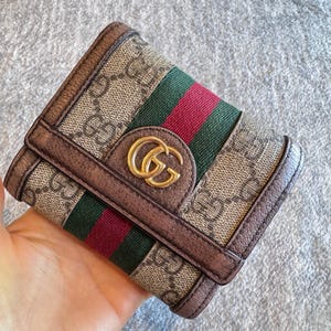 Cartera pequeña auténtica de Gucci