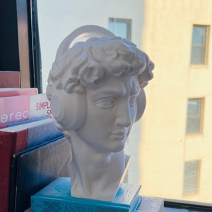 David Sculpture with Headphones