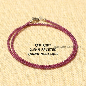May include: A double strand necklace made with 2.5mm faceted red ruby beads. The necklace is made with a silver clasp. "Red Ruby 2.5mm Faceted Round Necklace" and "Starlight Gems Hub" are printed on a white background.