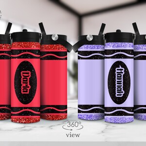 May include: Three personalized water bottles with glitter and black accents. The bottles are shaped like crayons and have the names "Darla" and "Hannah" on them.