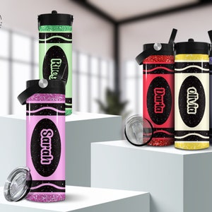 May include: Four personalized stainless steel tumblers with glitter and a crayon design. The tumblers are in the colors green, red, yellow, and purple. The names Riley, Darla, Olivia, and Hannah are printed on the tumblers.