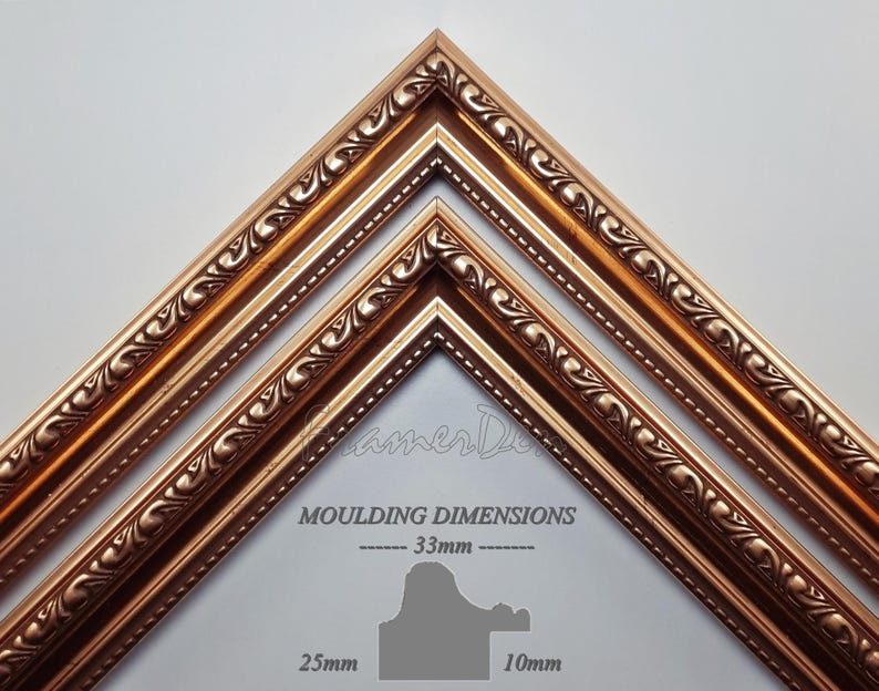 May include: Three ornate picture frames in a gold finish, stacked on top of each other. The frames have a decorative, intricate design with a beaded edge. The frame dimensions are listed as 33mm, 25mm, and 10mm.