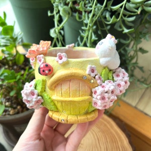 Handmade and hand painted succulent planter pot with Cartoon cute bunny and pink hydrangea house shape