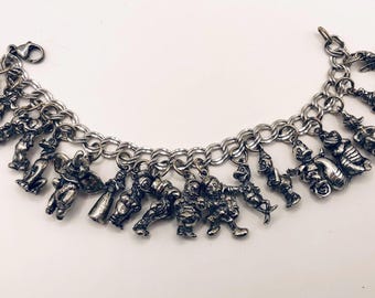 Pulsera vintage de plata de ley con dijes de Disney de los años 70 con 18 dijes