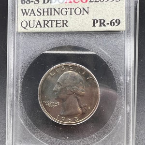 May include: A 1968-S Washington quarter graded PR-69 in a plastic coin holder. The coin is in excellent condition and has a silver finish.