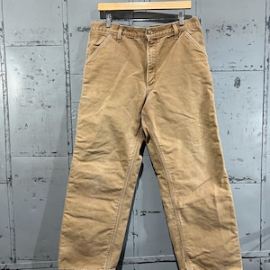 35x30 90s distressed worn in duck canvas Tan Carhartt blanket lined  pants Carpenter Style earth tone workwear