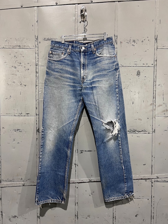 Size 33x31 distressed Levi’s 505 Denim Jeans