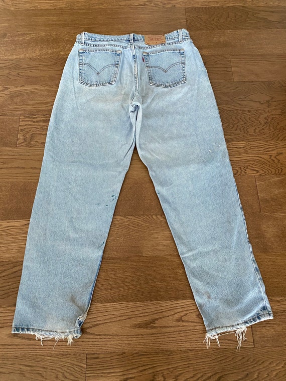 Vintage Levis 561 Womens Jeans Size 16 Loose Fit Straight Leg Light Wash  Denim Distressed 