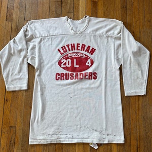 L 70s Lutheran Crusaders St Croix Lutheran  3/4 Sleeve Jersey Russell Athletic Shirt Football Tshirt Thrashed Distressed
