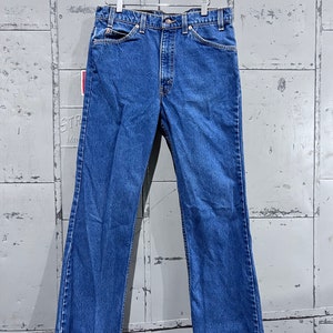 90s 32 waist Orange Tab Levi’s 517 boot cut denim jeans cowboy western style