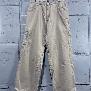 May include: A pair of beige work pants with multiple pockets and a straight leg.