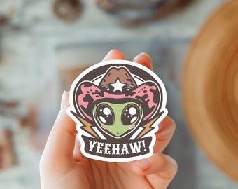 Sticker extraterrestre Yeehaw - Design extraterrestre western amusant - Cowboy de l'espace rétro - Art extraterrestre mignon - déco ovni - Art extraterrestre amusant - Art sur le thème des extraterrestres