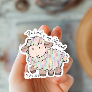 May include: A colorful sticker with a cartoon lamb and the text "The Lord is my Shepherd, Psalm 23:1".