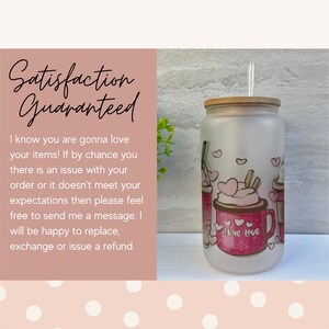 May include: A frosted glass tumbler with a bamboo lid and a straw. The tumbler has a pink and white design with a coffee cup and the words "true love".