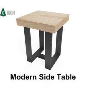 Könnte beinhalten: Ein moderner Beistelltisch mit einer hellholzfarbenen Tischplatte und einem schwarzen Metallgestell. Der Tisch ist etwa 50 cm hoch und 40 cm breit.