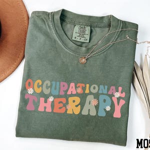a t - shirt with the words'ocupational therapy'on it