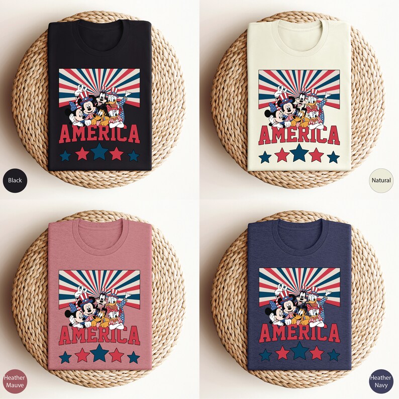 May include: Four t-shirts with a vintage-style graphic of Mickey Mouse, Minnie Mouse, Donald Duck, and Goofy in front of a red, white, and blue American flag with the word "AMERICA" printed below. The t-shirts are available in black, natural, heather mauve, and heather navy.