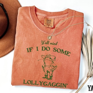 a t - shirt that says if i do some, lollygagin '