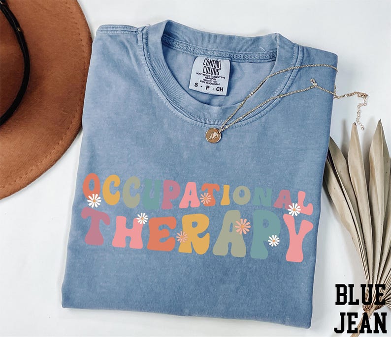 a blue shirt with the words corporation therapy on it