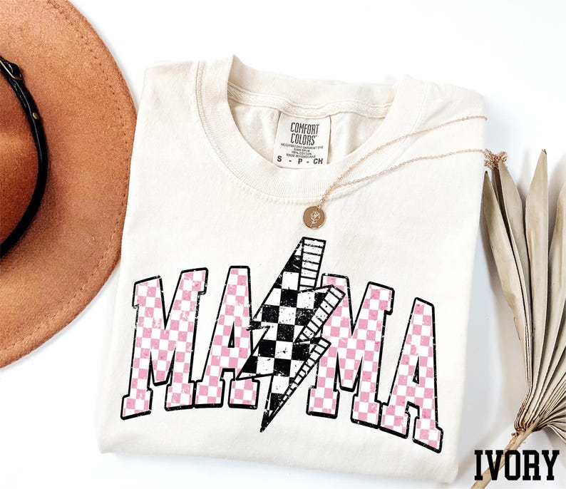 a hat, sunglasses, and t - shirt on a white surface
