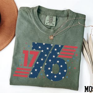 a hat and a t - shirt with the number seventy on it