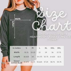 a woman wearing a black long-sleeved shirt, with a size chart displayed on the image.