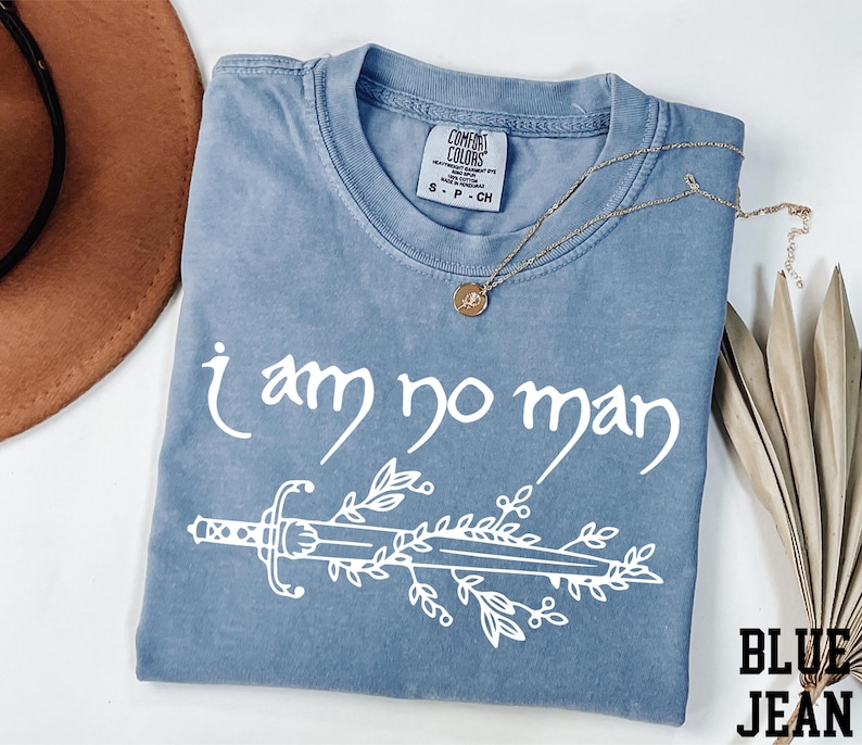 a t - shirt that says i am no man on it