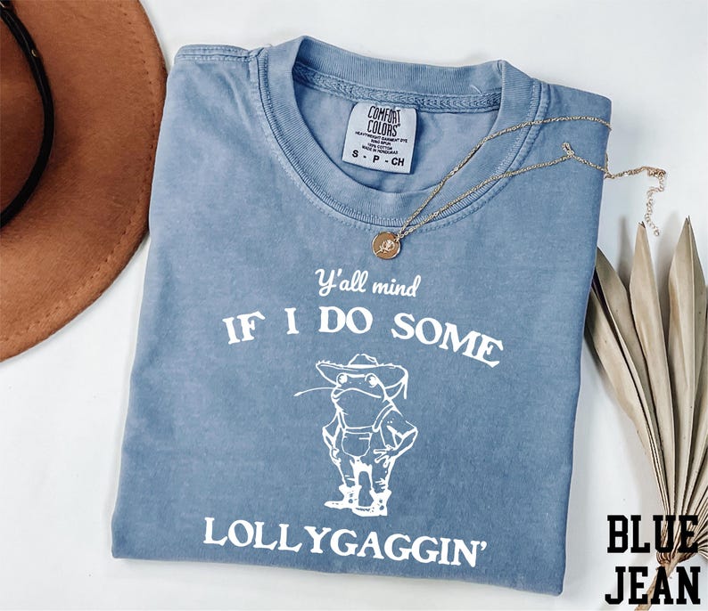 a blue t - shirt that says if i do some lollygagin '