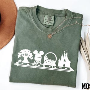 a t - shirt that has a picture of mickey mouse on it