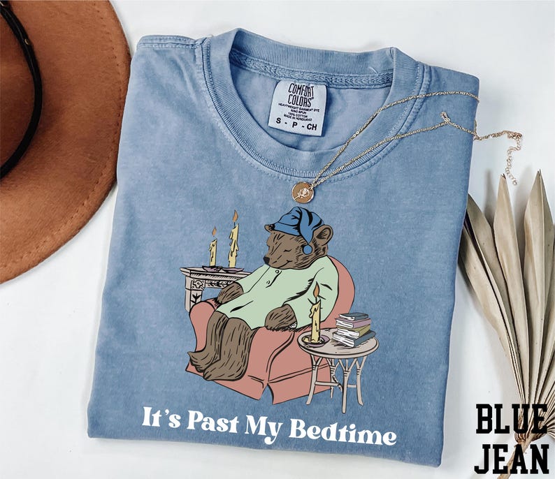 a t - shirt with a picture of a bear on it