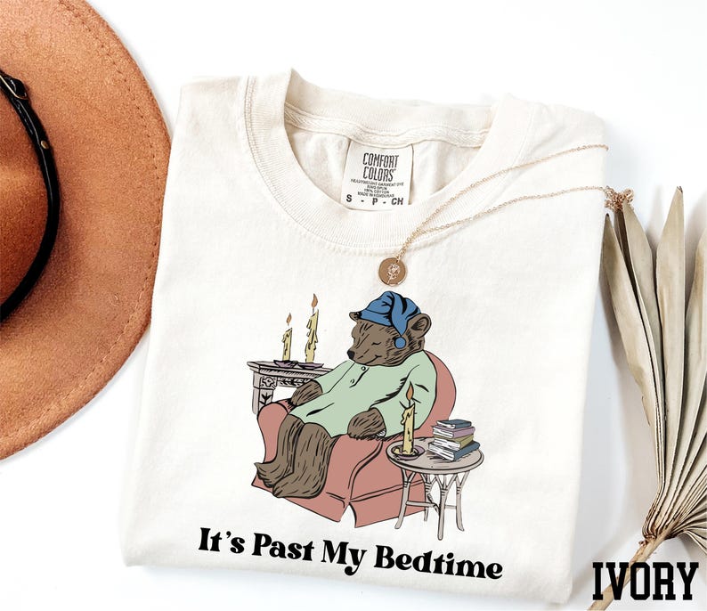 a t - shirt with a picture of a bear on it