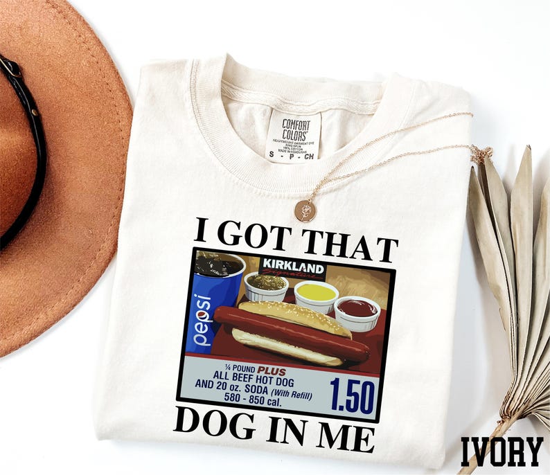 a t - shirt with a picture of a hot dog on it