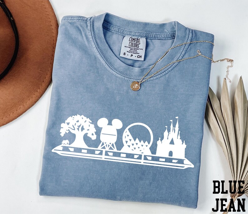 a blue tshirt with mickey mouse on it