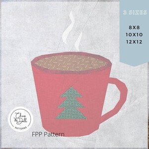 May include: A red mug with a green Christmas tree design and a brown liquid inside. Steam is rising from the mug. The text "Chris & Dell Patterns" and "FPP Pattern" are visible. The image is for a pattern for a quilted mug.