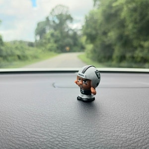 Calcetín navideño de 1 pulgada para el tablero del auto de los Raiders de Las Vegas de la NFL.