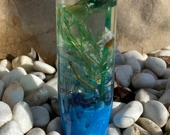 Perilla de cambio con flores azules y verdes
