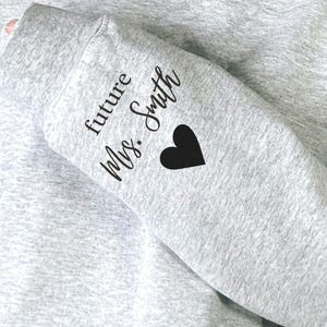 Future Mrs Shirt Name On Sleeve Bride To Be Engagement Gift For Future Wife Shirt engagement gift sweatshirt for bride in my engaged era custom name on sleeve future mrs shirt gift for woman future wife engagement clothing
